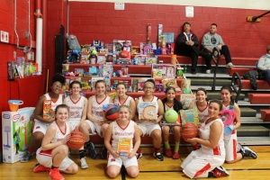 basketball team collects toys for tots