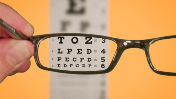 Image of glasses and eye chart