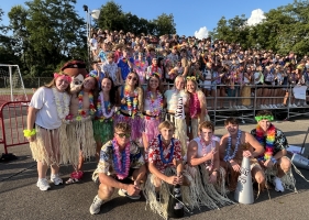 large group of kids dressed in Hawaiian outfits large group of kids dressed in Hawaiian outfits