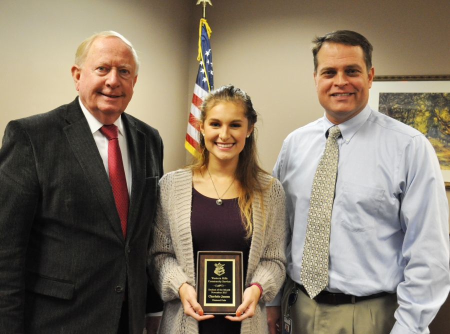 Charlotte Jansen receiving award