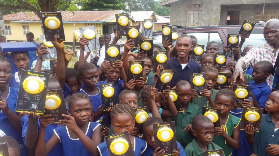 Students in Bumpe, Sierra Leone with their solar lanterns