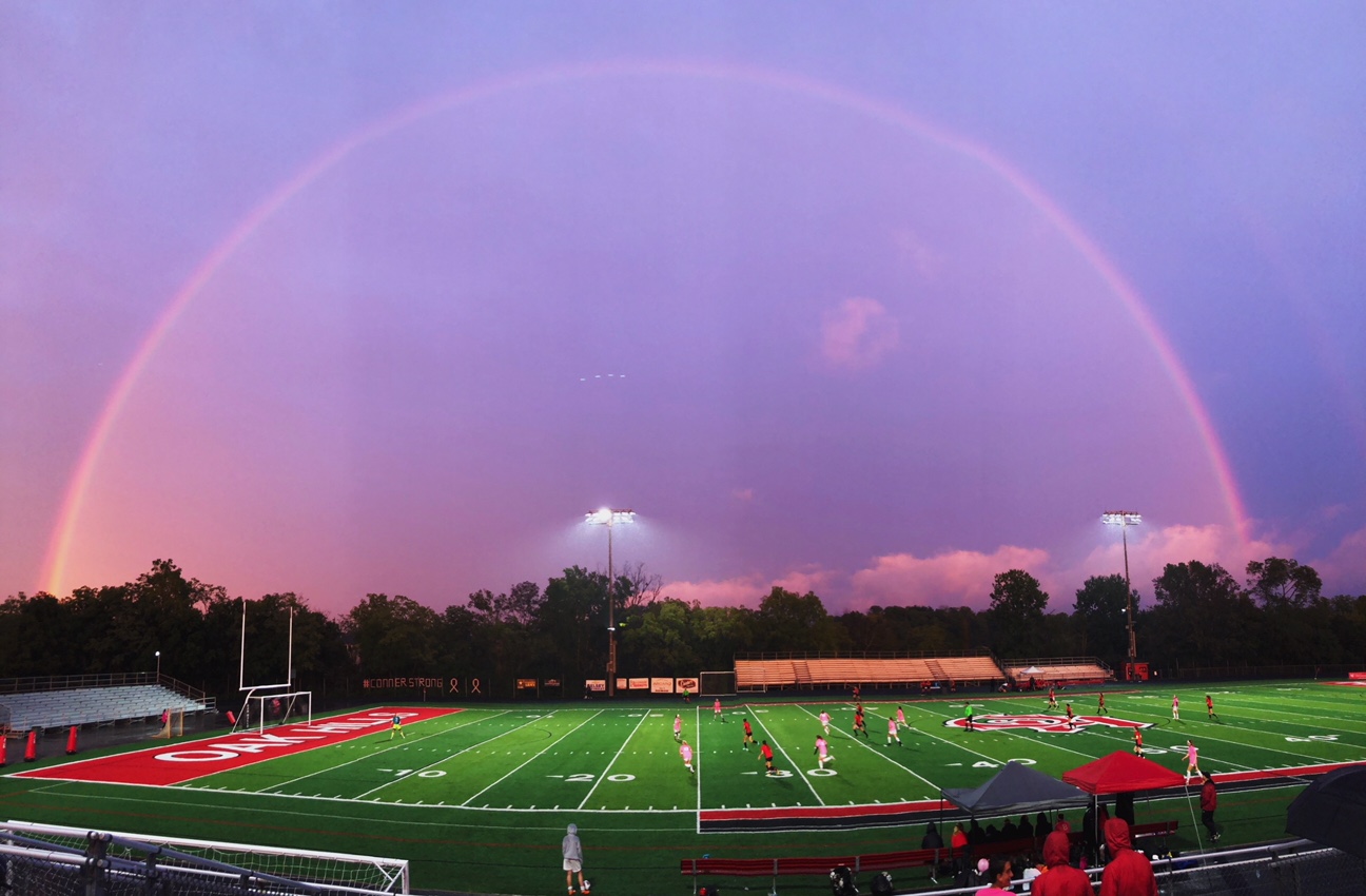 rainbow over soccer field