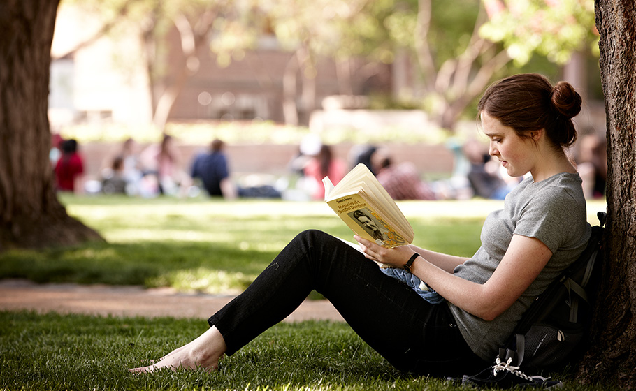 student reading a book