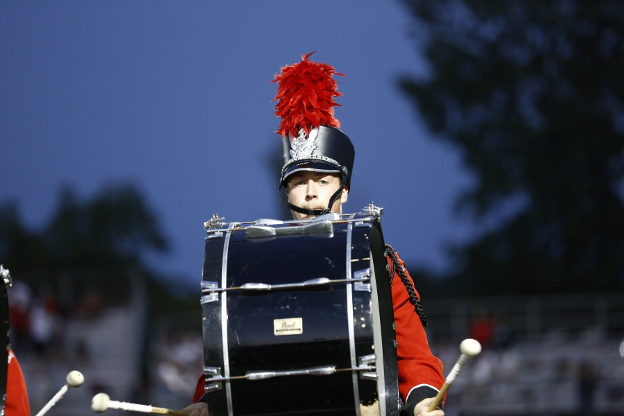 Carl Fisher marching with drumline. 