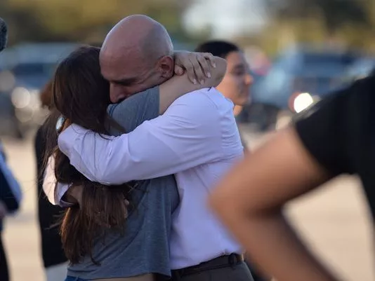 Father and daughter reuniting after tragic event